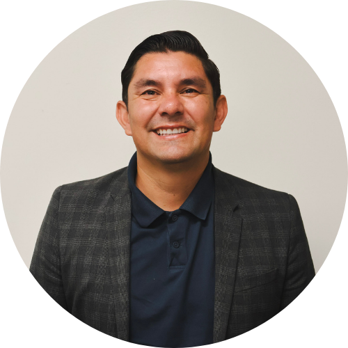 a child is drawing on a piece of paper