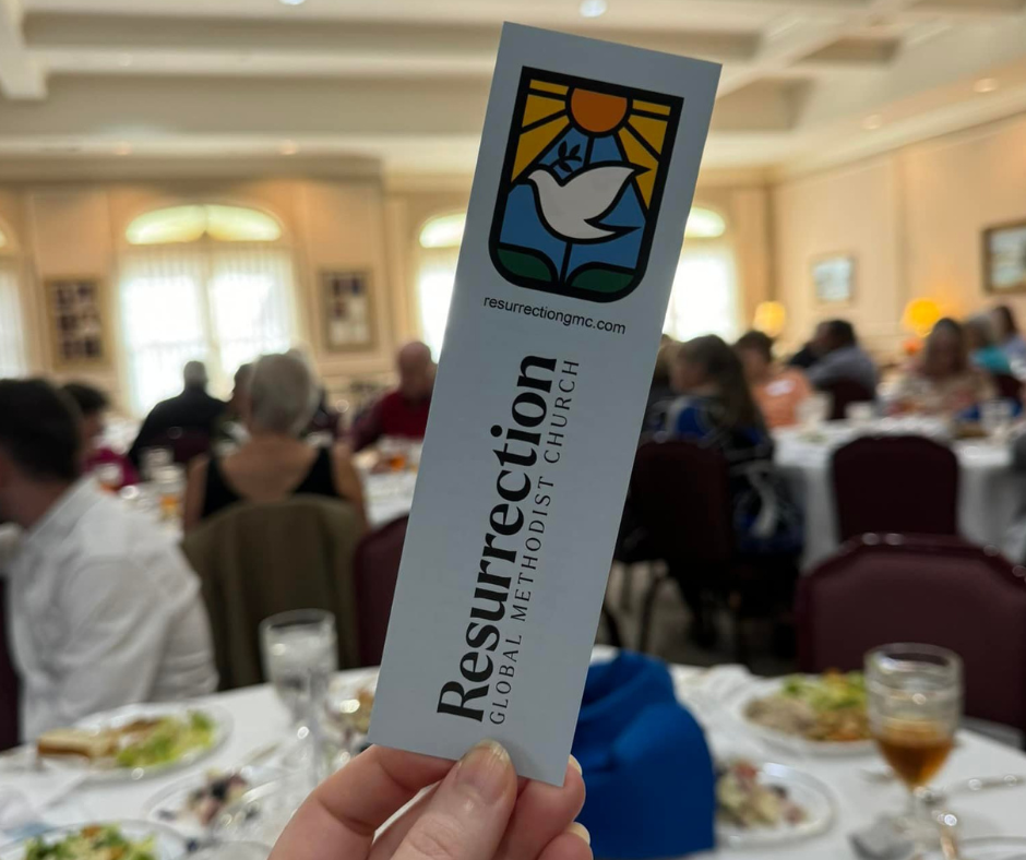 Resurrection Church woman reading book while sitting on chair
