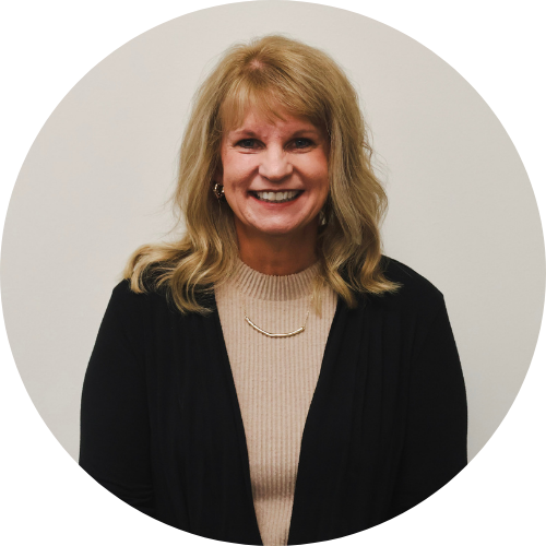 a child is drawing on a piece of paper